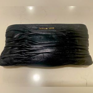 Michael Kors clutch. Black leather.